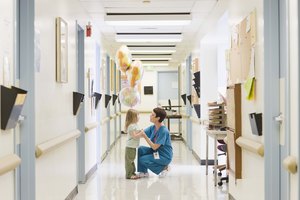 Doctor with girl in hospital