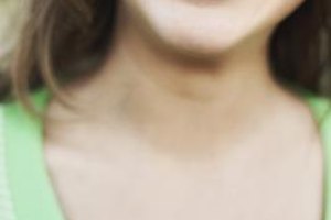 Jupiterimages/Brand X Pictures/Getty Images Orthodontists install braces and other devices to straighten the teeth and correct flaws in the smile.