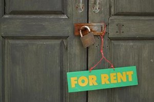 Jupiterimages/Photos.com/Getty Images Landlords must include certain information in your lease, including how much rent you pay each month.