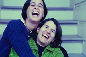 Thinkstock Images/Comstock/Getty Images Committed relationships between two women are both alike and distinct from heterosexual relationships.