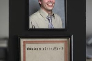 Kim Carson/Digital Vision/Getty Images Decorate your office with pictures, certificates and trophies to show your employees that you appreciate their hard work.