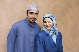 Thinkstock Images/Comstock/Getty Images A Muslim man and woman should not be alone together until they are married, according to Islamic tradition.