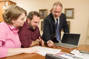 Jupiterimages/liquidlibrary/Getty Images Joint borrowers share responsibility for the debt, but do not always share ownership rights to the home.