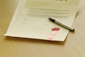 Stockbyte/Stockbyte/Getty Images Proper cancellation of employment contract is important to avoid the other party taking legal action.
