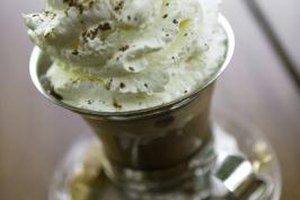 Photodisc/Photodisc/Getty Images Whipped cream softens and shrinks as it warms, unless it's stabilized with pudding or other ingredients.