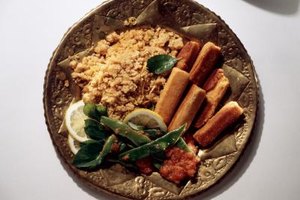 Eising/Photodisc/Getty Images In general, hot burghal pilaf goes with a hot main dish, and chilled burghal serves as a starter or mezze.