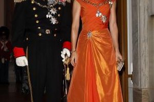 Danny Martindale/Getty Images Entertainment/Getty Images Denmark's Crown Prince Frederik and Princess Mary make a grand entrance at a New Year's banquet in Copenhagen on Jan. 1, 2013.