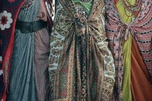 Goodshoot/Goodshoot/Getty Images Bantus, like these women in traditional clothing, mixed with Arab traders in Kenya to create the Swahili people and language.