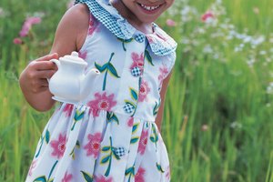 Una fiesta de té se relaciona con los libros de American Girl.