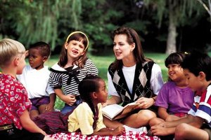 Comstock/Stockbyte/Getty Images Early childhood educators may need a college-level degree to work with children ages 3- through 5-years.