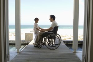 Man in wheelchair with son