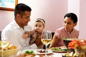 Kraig Scarbinsky/Stockbyte/Getty Images A nursing mother can safely drink an occasional glass of wine with dinner, HealthyChildren.org states.