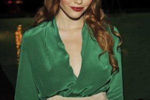 John Shearer/Getty Images Entertainment/Getty Images Actress Holland Roden wears a silk blouse at NYLON Magazine's Young Hollywood Issue Party in Hollywood.