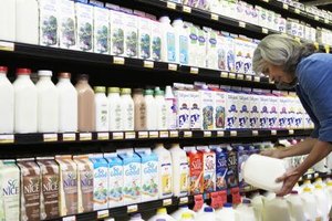 Noel Hendrickson/Digital Vision/Getty Images Choose the right almond milk for your family, as there are many options ranging from flavored to organic.