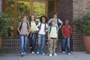 Jupiterimages/Pixland/Getty Images The amount of education their parents have has a proven influence on these students' academic achievement.