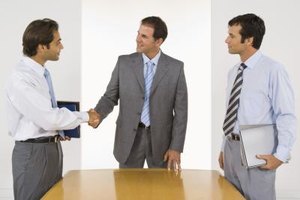 Jupiterimages/Pixland/Getty Images Displaying your knowledge of the company and position in your cover letter may help you land an interview.