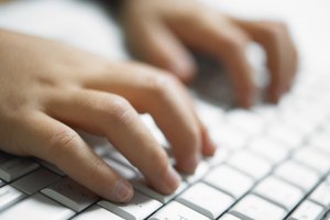 Cómo abrir un reproductor de CD en una Mac sin un teclado.