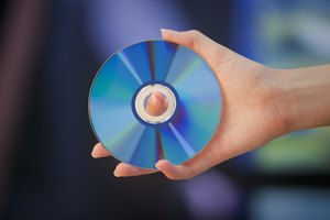 Inserta un disco estándar de 4-3/4 pulgadas (12,06 cm) en la ranura si encuentras problemas para reproducir o expulsar discos.
