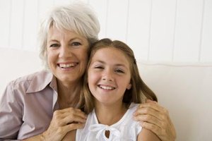 Jupiterimages/Pixland/Getty Images Parents want their children to have good relationships with grandparents but not to smother them with attention.