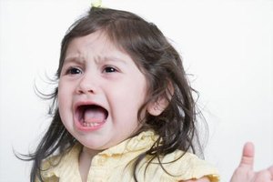 Jupiterimages/Photos.com/Getty Images A child's attention-seeking behavior could have a simple explanation, or there could be more than meets the eye.