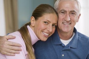 Comstock Images/Comstock/Getty Images A father's relationship with his daughter has a huge influence on her romantic relationships with men.