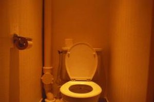 Stockbyte/Stockbyte/Getty Images Following a similar routine both at home and at school can help your child learn to use the toilet faster.