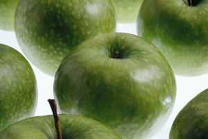 La cantidad de ácido málico es más alta en las manzanas agrias.