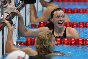 Reacción de Katie Lendecky al ganar la medalla de oro en los 800 metros en las olimpiadas de Londres.