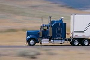 Digital Vision./Digital Vision/Getty Images A senior logistics analyst working in the trucking industry ensures deliveries are timely and efficient.