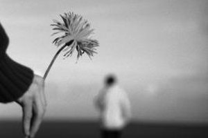 John Foxx/Stockbyte/Getty Images Presenting your crush with a small token of your sincerity may make a difference when you apologize.