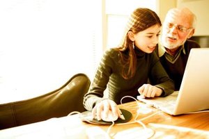 NA/Photos.com/Getty Images Teens with Internet and social networking skills can make money by sharing their knowledge with older generations.