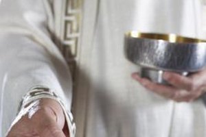 Brand X Pictures/Brand X Pictures/Getty Images After confessing their mortal sins, Catholics are in a state of a grace and able to receive communion.