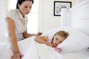 Goodshoot/Goodshoot/Getty Images When your child rejects her other parent, reassure her that you are okay with her loving both of you.