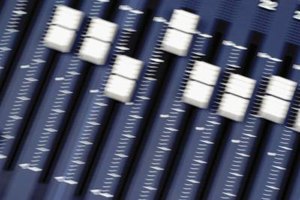 Medioimages/Photodisc/Photodisc/Getty Images Equalizers allow much finer control of sound quality than the Bass and Treble controls found on most receivers.