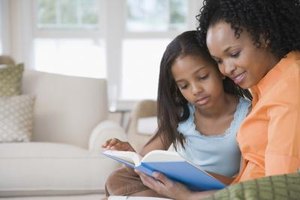Jack Hollingsworth/Photodisc/Getty Images With an effective parenting strategy, single mothers can raise children who become successful, well-adjusted adults.