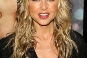 Stephen Lovekin/Getty Images Entertainment/Getty Images Stylist Rachel Zoe, a big fan of 70s fashion, is often photographed wearing floppy hats and knit caps.