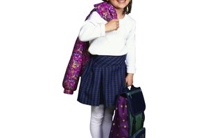 Girl with backpack and coat