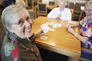Brand X Pictures/Stockbyte/Getty Images If your loved one is losing her vision, try to find ways to help her continue with activities she enjoys.
