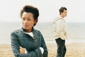 Digital Vision./Photodisc/Getty Images Emotional affairs can create an emotional rift, and they can become physical affairs, in some cases.