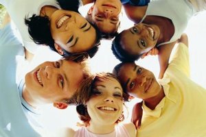 Stockbyte/Stockbyte/Getty Images Teens might benefit from processing their feelings about divorce in a support group with other teens.