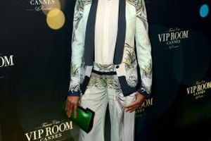 Ian Gavan/Getty Images Entertainment/Getty Images Singer Solange Knowles wears a stunning pant suit to a party at the VIP Room nightclub at the 2013 Cannes Film Festival