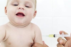 Stockbyte/Stockbyte/Getty Images An immunized baby has only a slight risk of contracting an infectious disease from an unimmunized child.