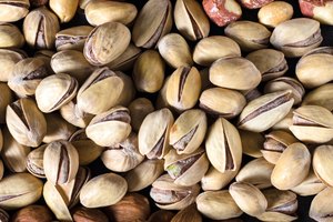 Imagen de pistachos, almendras y maníes