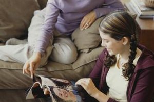 Ryan McVay/Photodisc/Getty Images Looking through a teen magazine with a young person gives you an opportunity to discuss important issues.