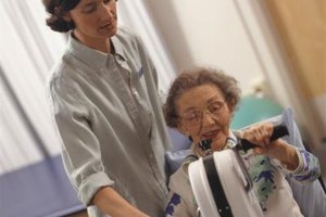 Keith Brofsky/Digital Vision/Getty Images Physical therapists help patients alleviate pain through a combination of stretching, movement exercises and the use of specialized equipment.