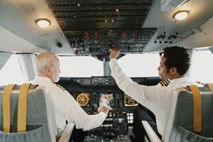Digital Vision./Digital Vision/Getty Images Both Navy and civilian pilot careers take an incredible amount of time, energy, dedication and financial investment.