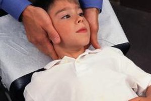 Keith Brofsky/Photodisc/Getty Images Pediatric chiropractors use gentle manipulations to safely and comfortably adjust your child's spine.