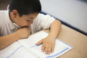 Creatas/Creatas/Getty Images The FCAT assesses student progress on academic benchmarks identified in Florida's Sunshine State Standards.