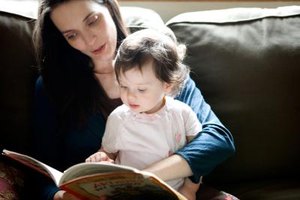 Jupiterimages/Photos.com/Getty Images Children with speech delays can get practice hearing word sounds when their parents read aloud to them.