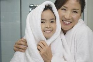 Brand X Pictures/Brand X Pictures/Getty Images If you and your child are comfortable, taking a shower together can help you demonstrate and teach proper shower steps.